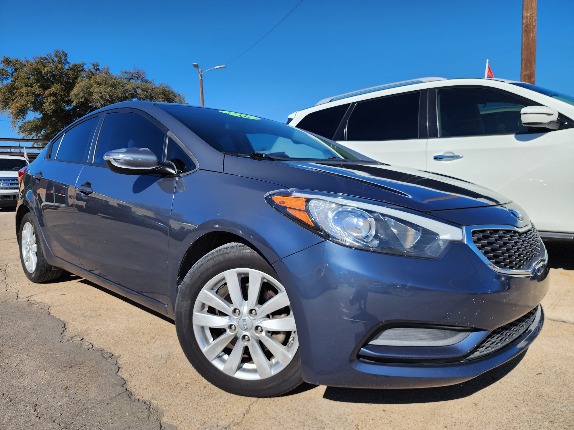 2016 BLUE Kia Forte LX (KNAFX4A65G5) with an 1.8L L4 DOHC 16V engine, 6-Speed Automatic transmission, located at 2660 S.Garland Avenue	, Garland, TX, 75041, (469) 298-3118, 32.885387, -96.656776 - Photo #0